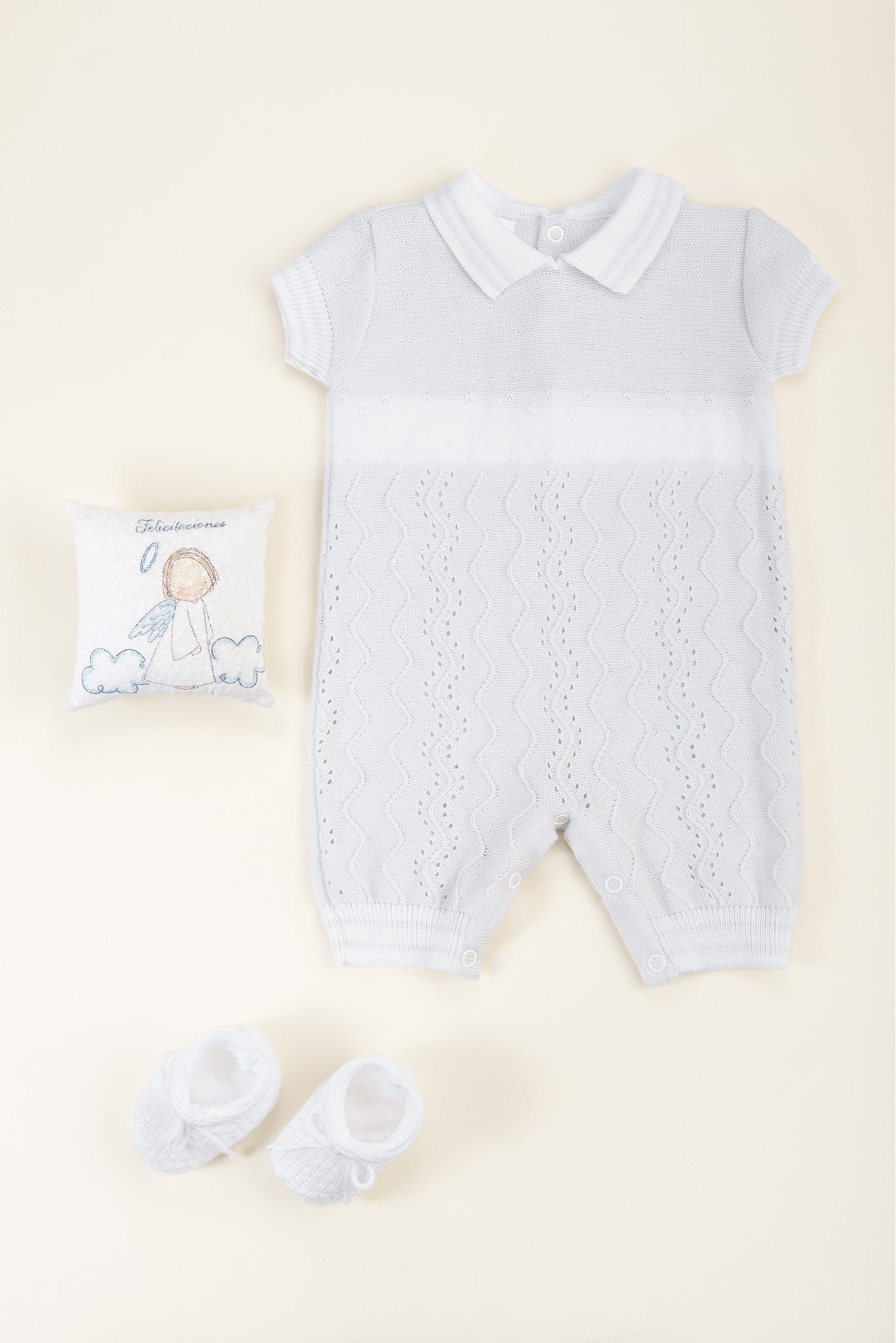 Set Henry, que incluye un pelele, patucos y gorro