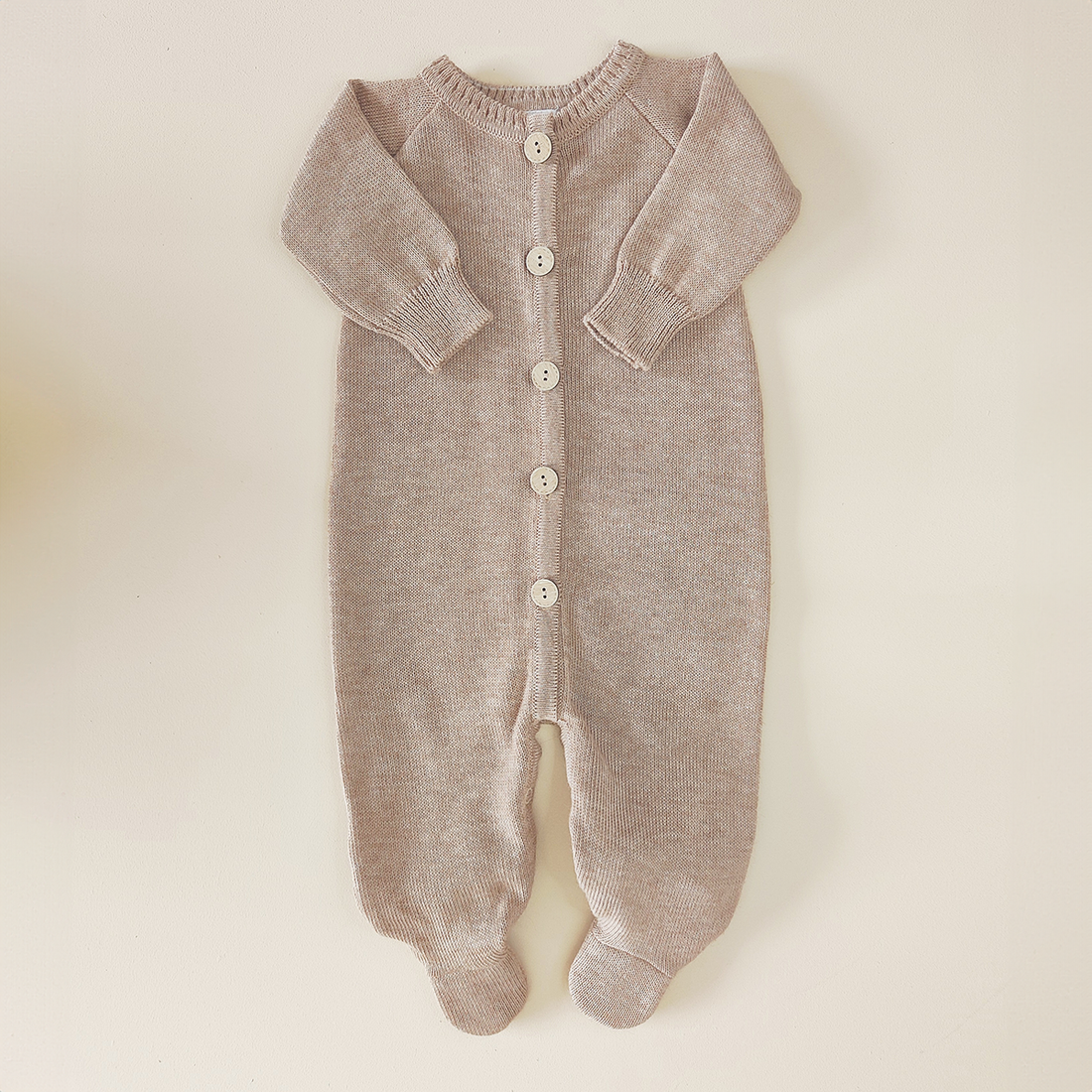 Mameluco con botones al frente con  pie