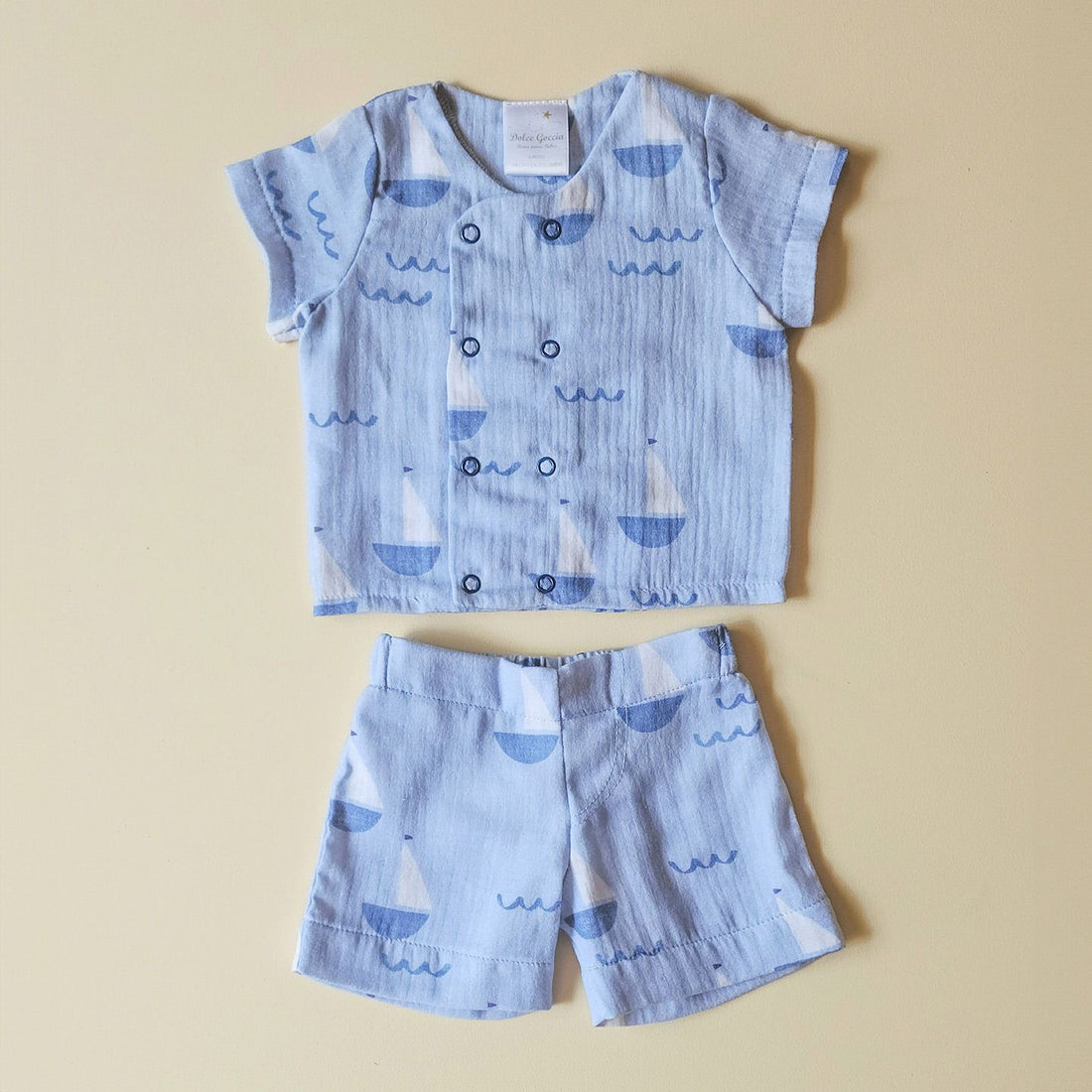 conjunto de tela  estampado de barquitos y olas